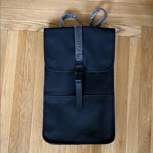 Rains Black Waterproof Backpack W3 with MongoDB logo